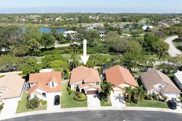 aerial view with a water view and a residential view