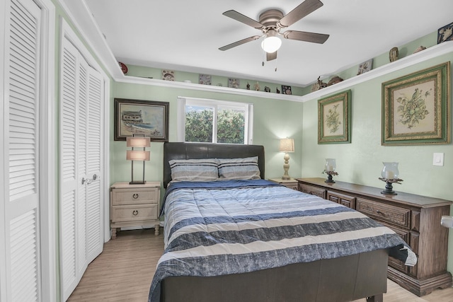 bedroom featuring ceiling fan and light wood finished floors