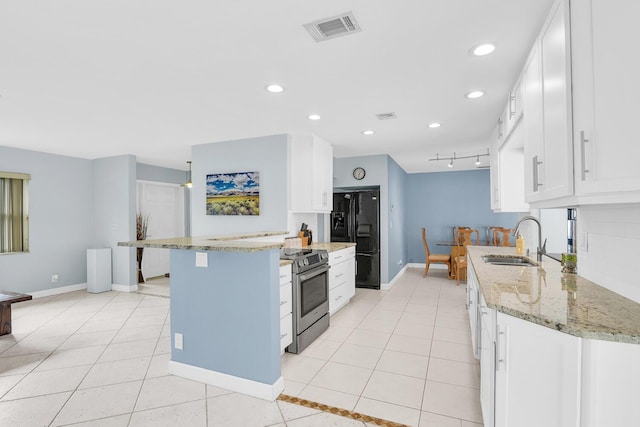 kitchen with light tile patterned floors, visible vents, black refrigerator with ice dispenser, stainless steel range with electric stovetop, and a sink