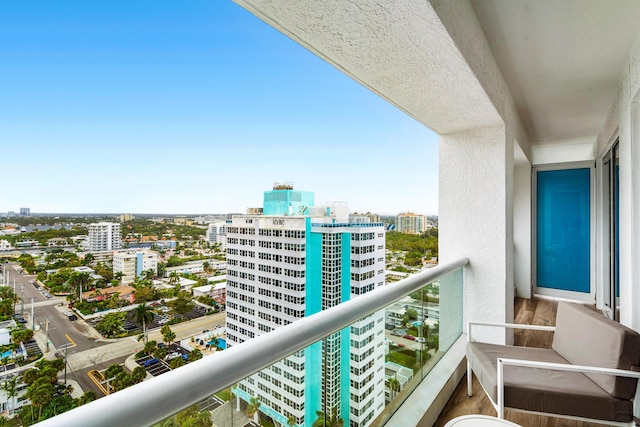 balcony featuring a view of city