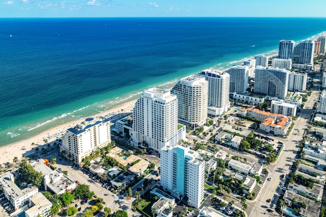 bird's eye view featuring a view of city, a water view, and a view of the beach