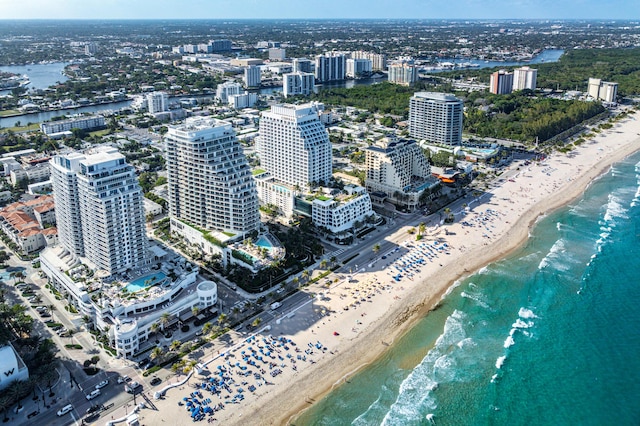 bird's eye view with a view of city, a beach view, and a water view