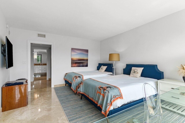 bedroom with marble finish floor, baseboards, and visible vents