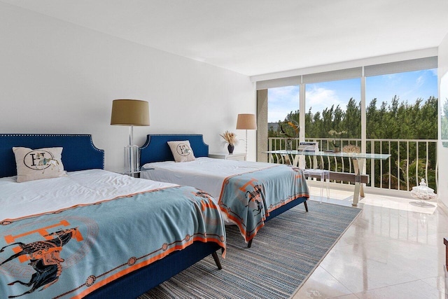 bedroom with floor to ceiling windows