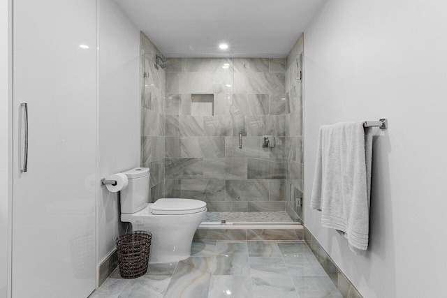 full bathroom featuring a stall shower, marble finish floor, toilet, and recessed lighting