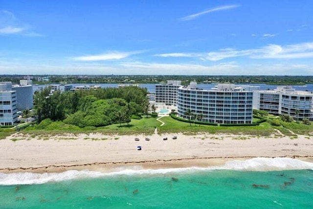 bird's eye view with a view of the beach and a water view