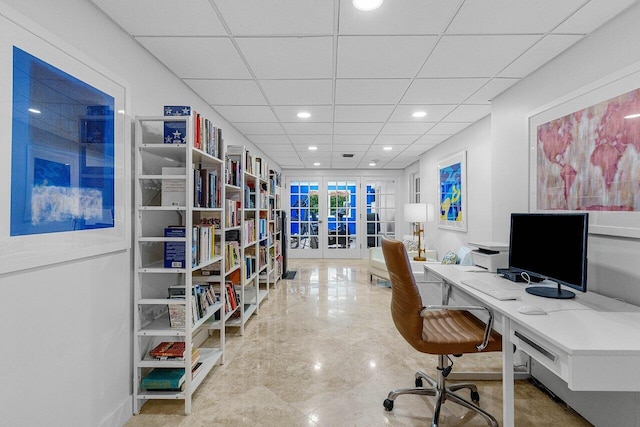 office featuring recessed lighting, french doors, and a drop ceiling