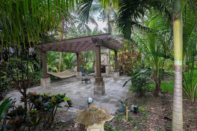 view of patio featuring a pergola