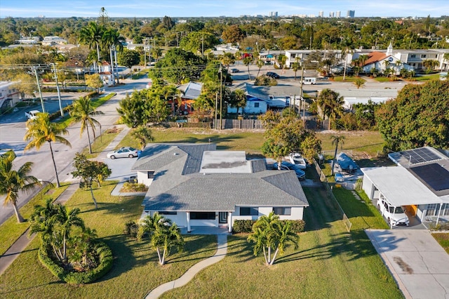 birds eye view of property with a residential view