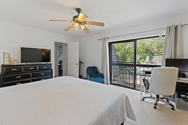 carpeted bedroom with a ceiling fan, access to outside, and a textured ceiling