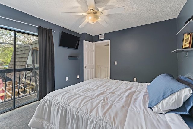 bedroom featuring visible vents, a ceiling fan, access to outside, a textured ceiling, and carpet floors