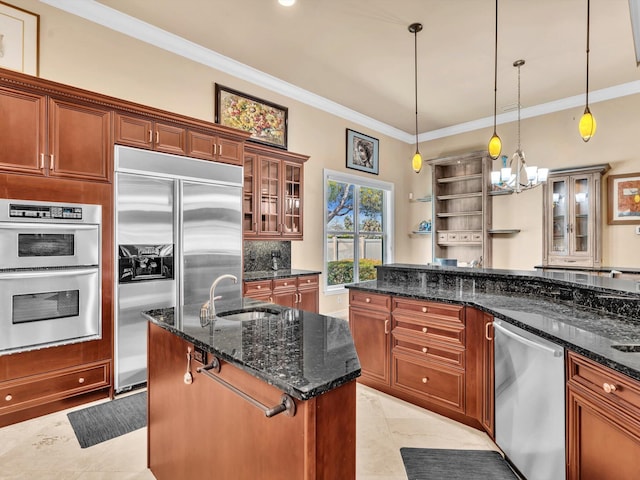 kitchen featuring backsplash, ornamental molding, hanging light fixtures, stainless steel appliances, and a sink