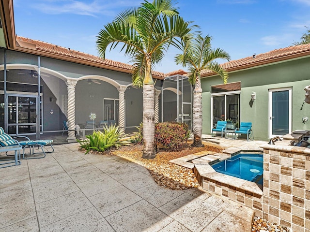 3934 Sherwood Blvd, Delray Beach, FL 33445 - exterior space with a ceiling fan and a patio area