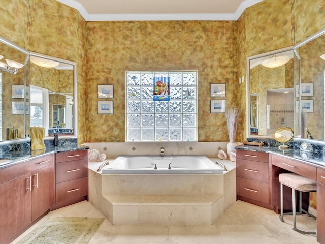 full bath featuring a wealth of natural light, a garden tub, vanity, and crown molding