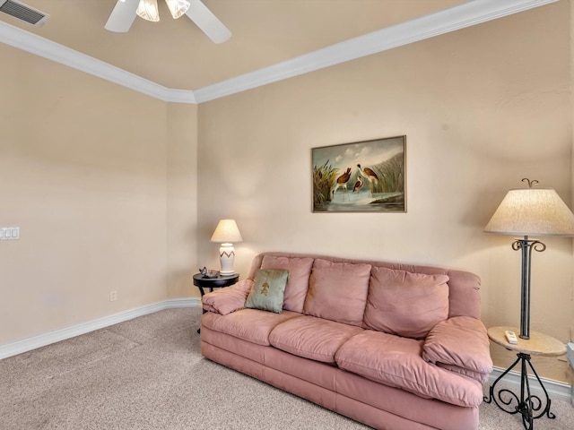 living area featuring visible vents, carpet flooring, baseboards, and ornamental molding