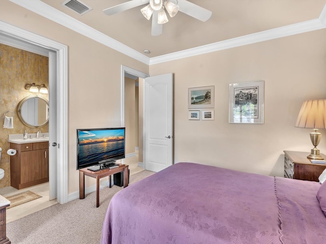 bedroom with baseboards, light colored carpet, visible vents, and ornamental molding