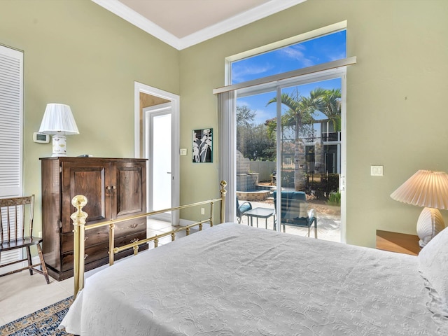 bedroom featuring access to exterior, baseboards, and ornamental molding