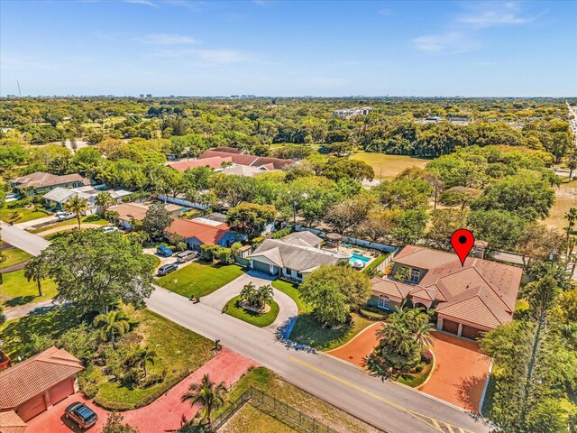 3934 Sherwood Blvd, Delray Beach, FL 33445 - mediterranean / spanish home featuring fence, a garage, stucco siding, a tiled roof, and driveway