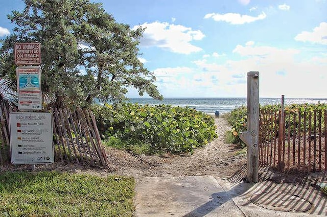 water view featuring fence