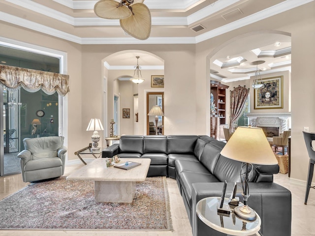 living room with visible vents, coffered ceiling, a premium fireplace, arched walkways, and ornamental molding