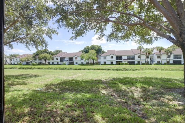 view of yard featuring a residential view