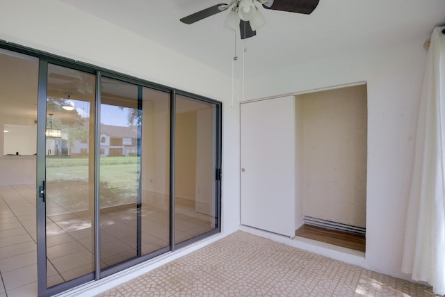 interior space featuring a ceiling fan