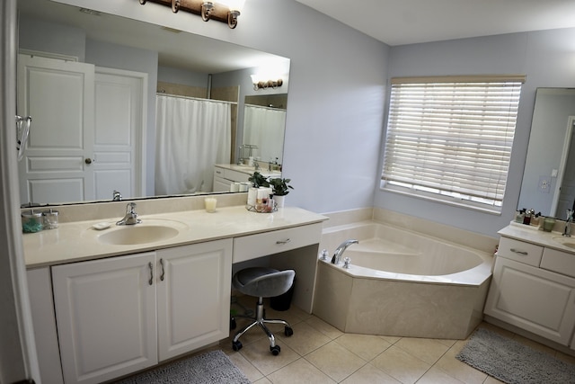 full bath with a garden tub, vanity, curtained shower, and tile patterned floors