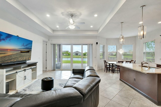 living room featuring plenty of natural light and light tile patterned flooring