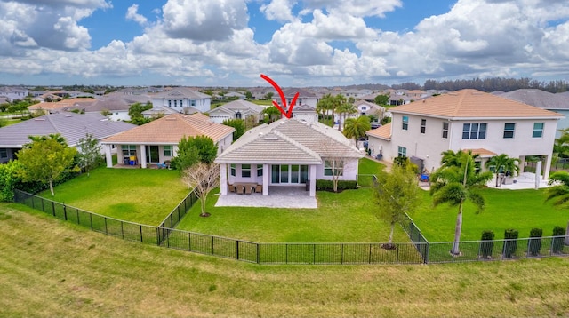 birds eye view of property with a residential view