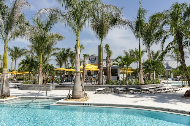 pool featuring a patio area