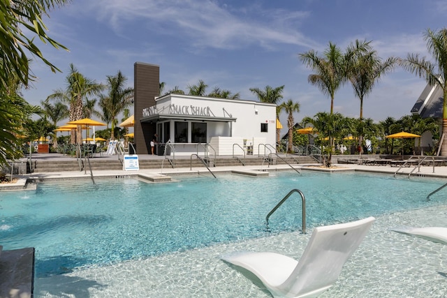 pool with a patio area