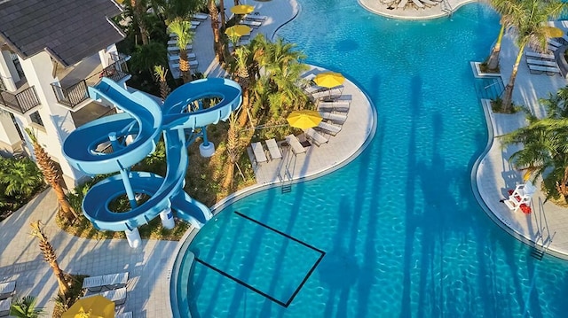 community pool with a water slide