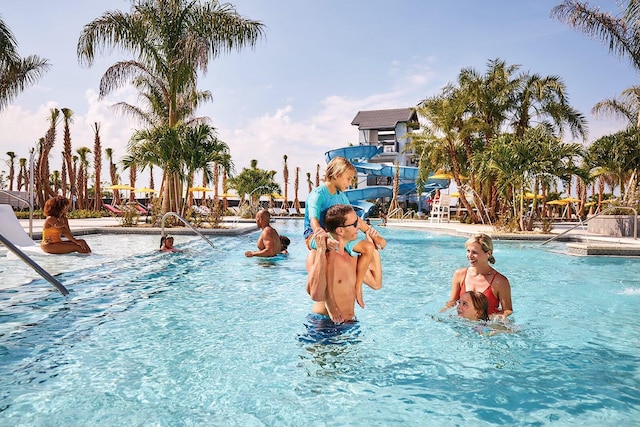 view of pool featuring a water slide