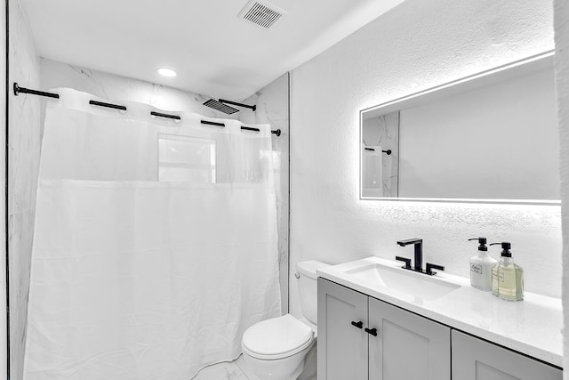 full bath featuring curtained shower, visible vents, a textured wall, toilet, and vanity