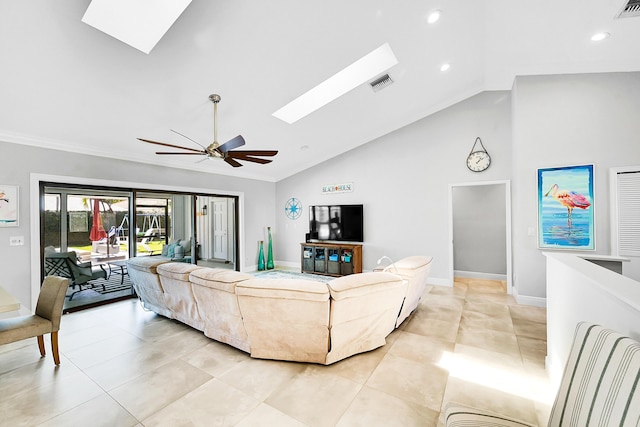 living room featuring a ceiling fan, visible vents, baseboards, recessed lighting, and lofted ceiling with skylight