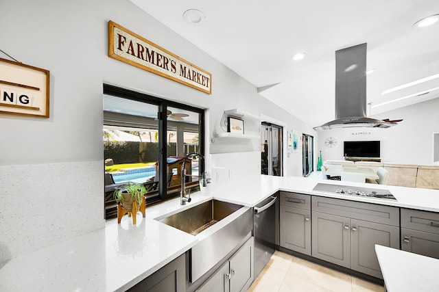 kitchen with gray cabinetry, stainless steel dishwasher, black electric cooktop, and island range hood