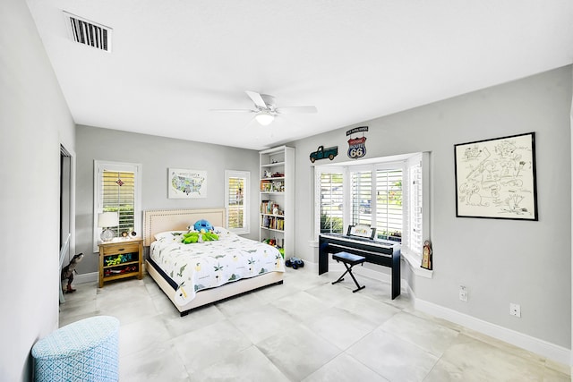 bedroom with visible vents, ceiling fan, and baseboards