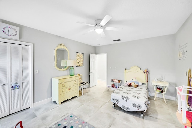 bedroom featuring visible vents, baseboards, a closet, and ceiling fan