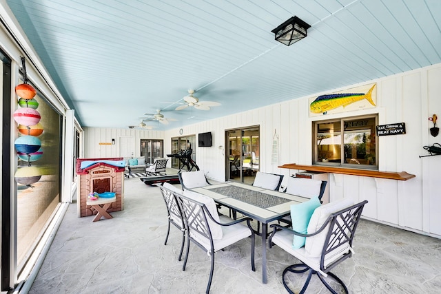 view of patio / terrace featuring ceiling fan and outdoor dining space