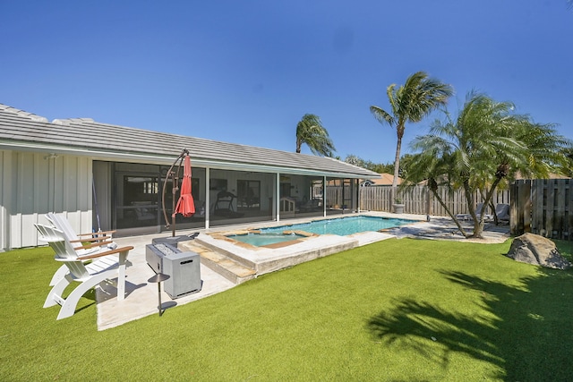 view of swimming pool featuring a fenced in pool, a yard, a fenced backyard, a fire pit, and a patio area