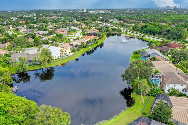 aerial view featuring a residential view and a water view