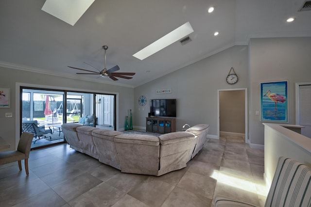 living area with visible vents, a skylight, a ceiling fan, and ornamental molding