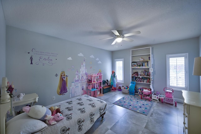 bedroom featuring a textured ceiling and ceiling fan