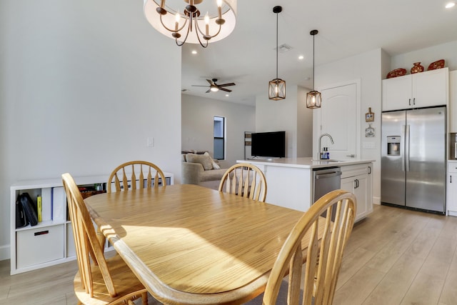 dining area with recessed lighting, visible vents, ceiling fan, and light wood-style flooring