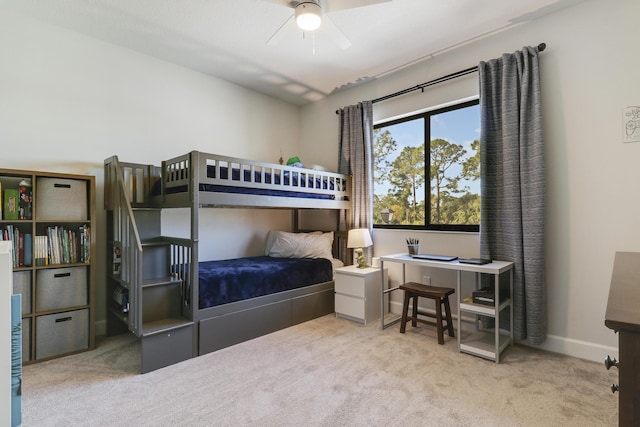 bedroom featuring carpet floors and baseboards