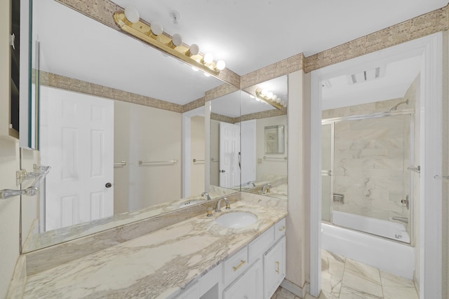 full bath with shower / bath combination with glass door, visible vents, marble finish floor, and vanity