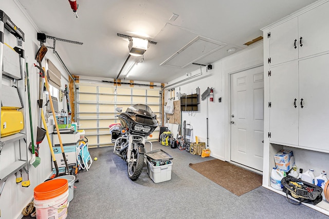 garage featuring a garage door opener