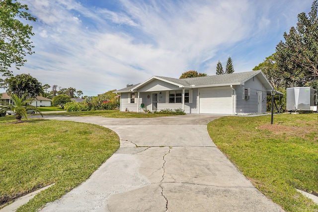 ranch-style house featuring an attached garage, concrete driveway, and a front lawn