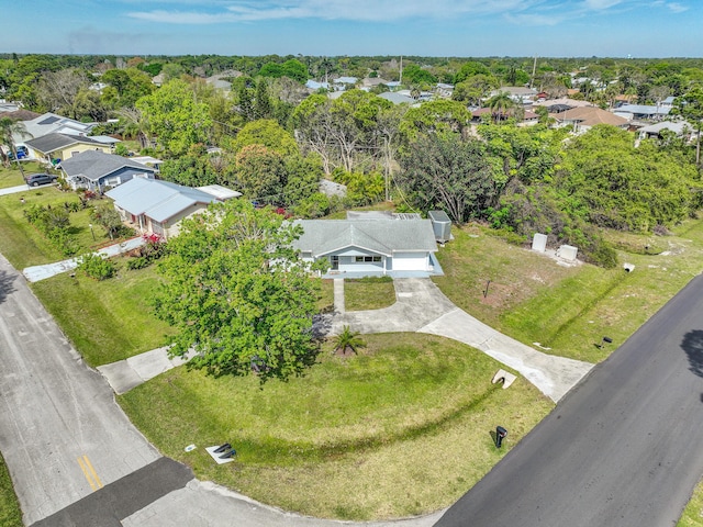 birds eye view of property with a residential view