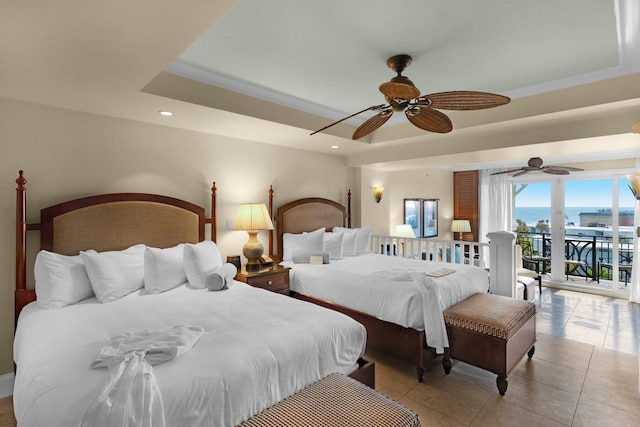 bedroom with ceiling fan, light tile patterned flooring, recessed lighting, access to exterior, and a raised ceiling